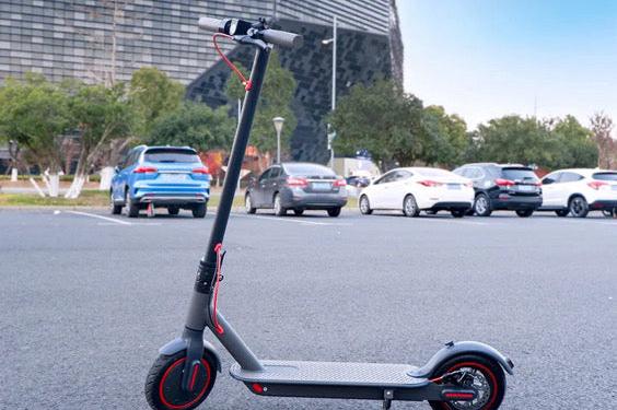 e1 electric scooter parked side view