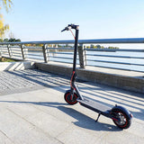 e1 electric scooter parked on the road